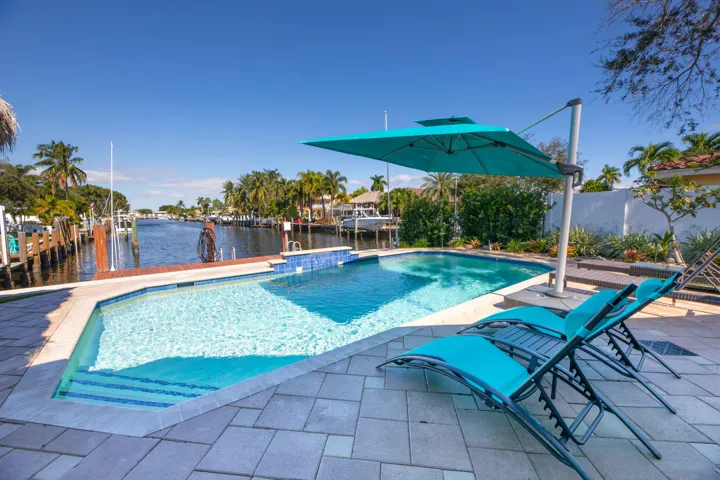 Beautiful pool with lots of room for tables or chairs.