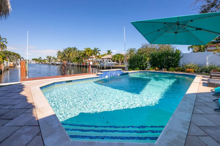 Pool has been renovated. and has a direct view of the water with plenty of room for seating and entertaining.