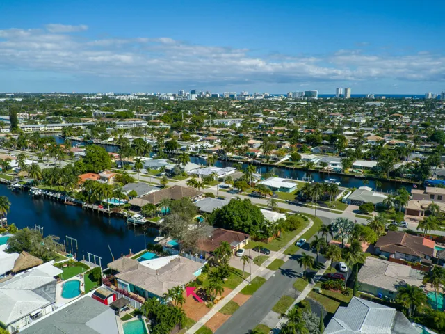 Drone view with house and water.