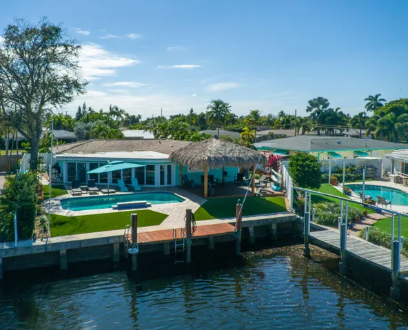 Your outside oasis with brand new dock (shown in next pic). Navigable canals for boating to the ocean.