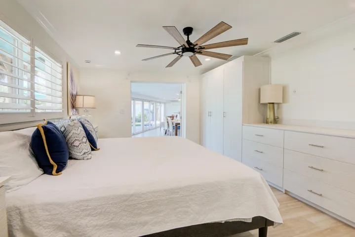 Primary suite with brand new built-in nightstand and clothes storage.