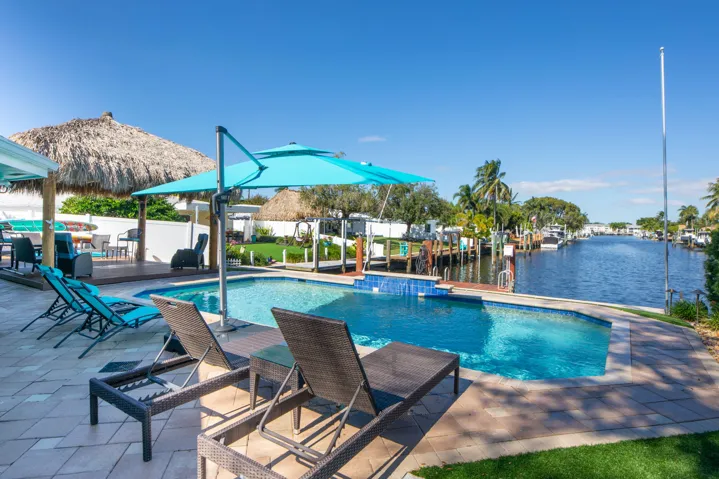 Beautiful pool with lots of room for tables or chairs.
