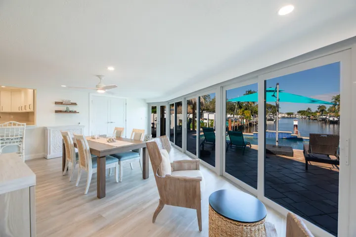 Gorgeous water views through wall to ceiling storm windows and electric blinds to close for privacy.