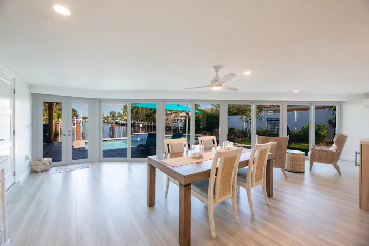 Gorgeous water views through wall to ceiling storm windows and electric blinds to close for privacy.