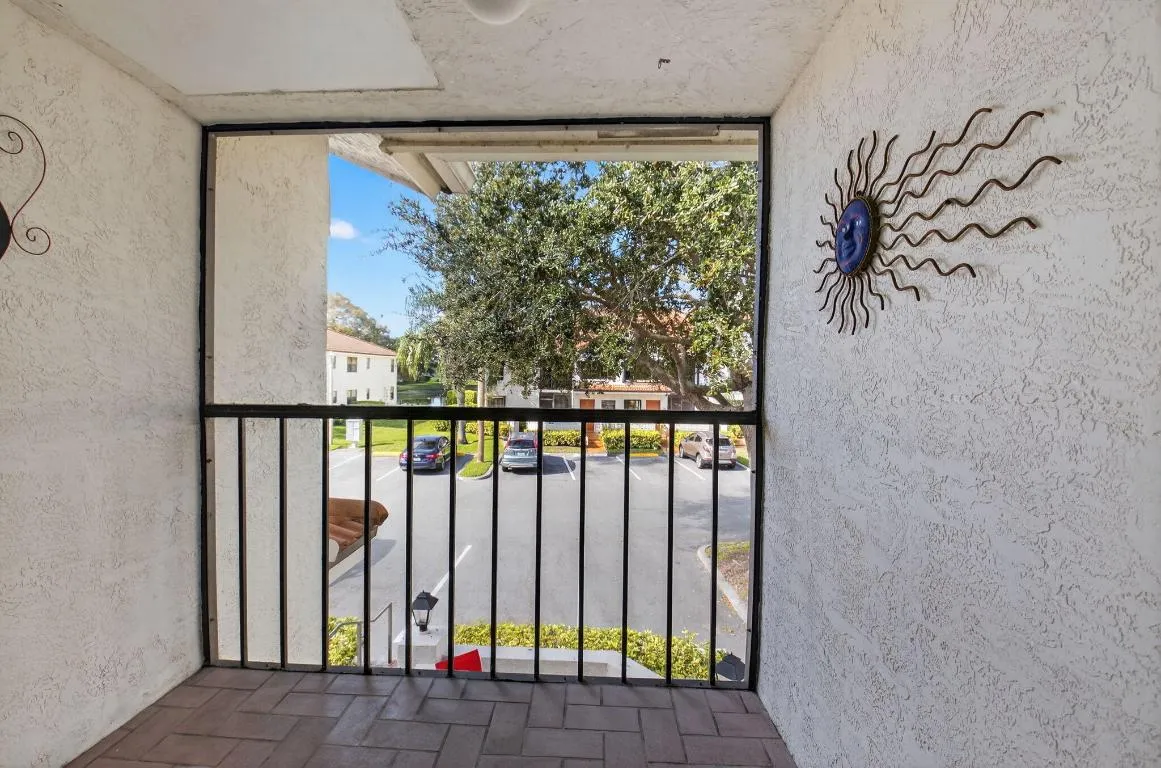 FRONT SCREENED BALCONY FROM KITCHEN