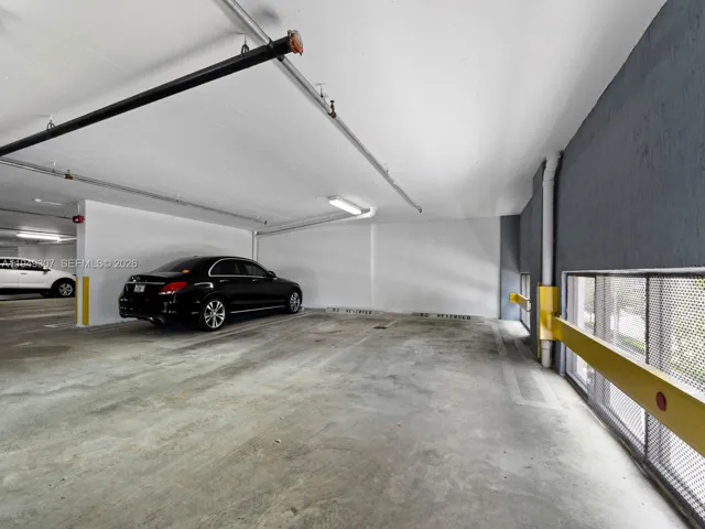 2 side by side assigned parking spaces