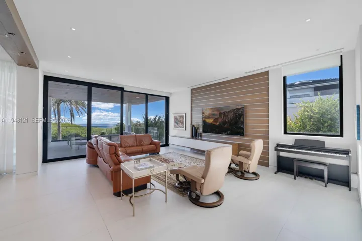 Great family room with floor-to-ceiling sliders for open flow out to the patio.