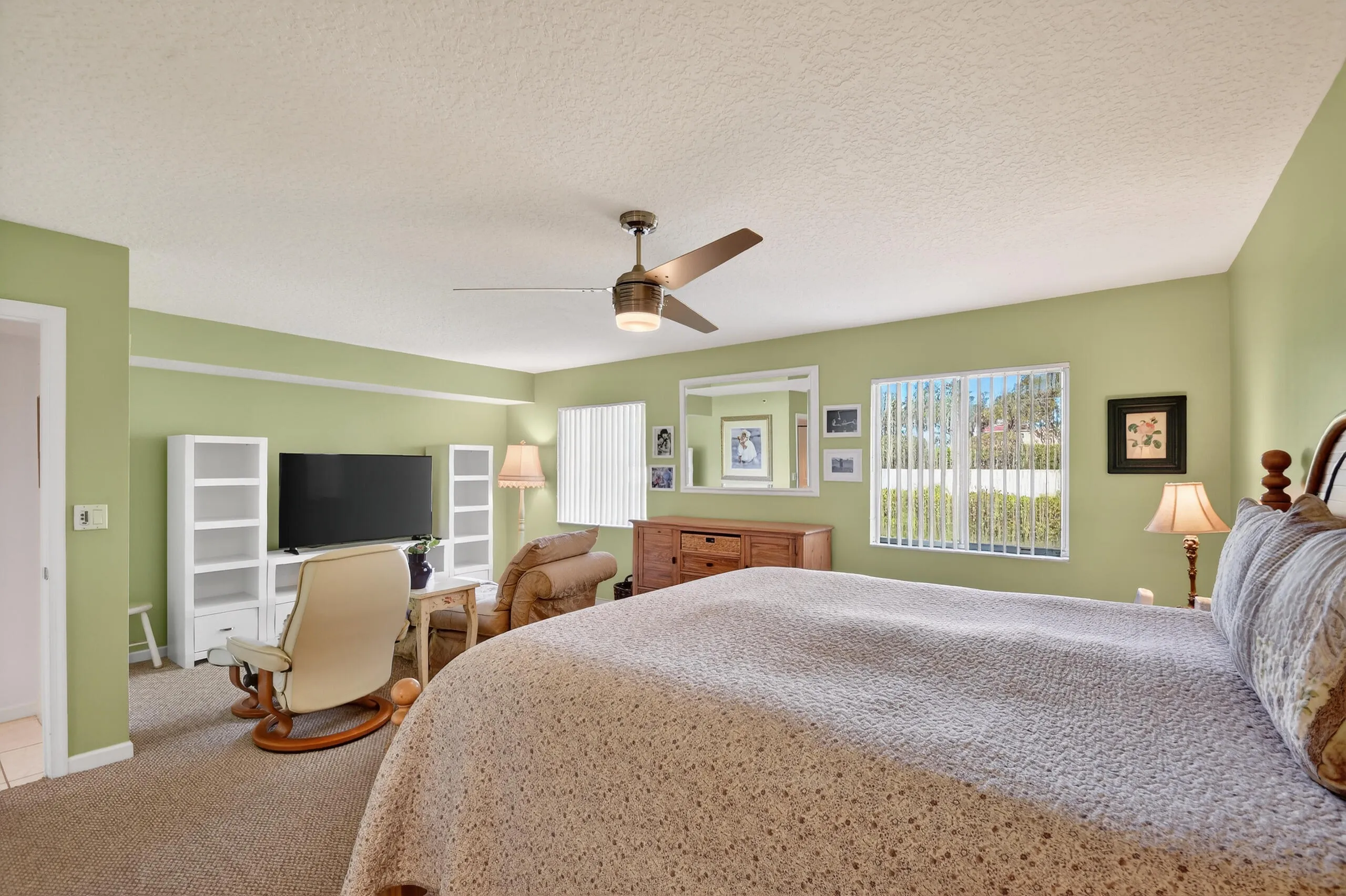 Oversized bedroom with sitting area.