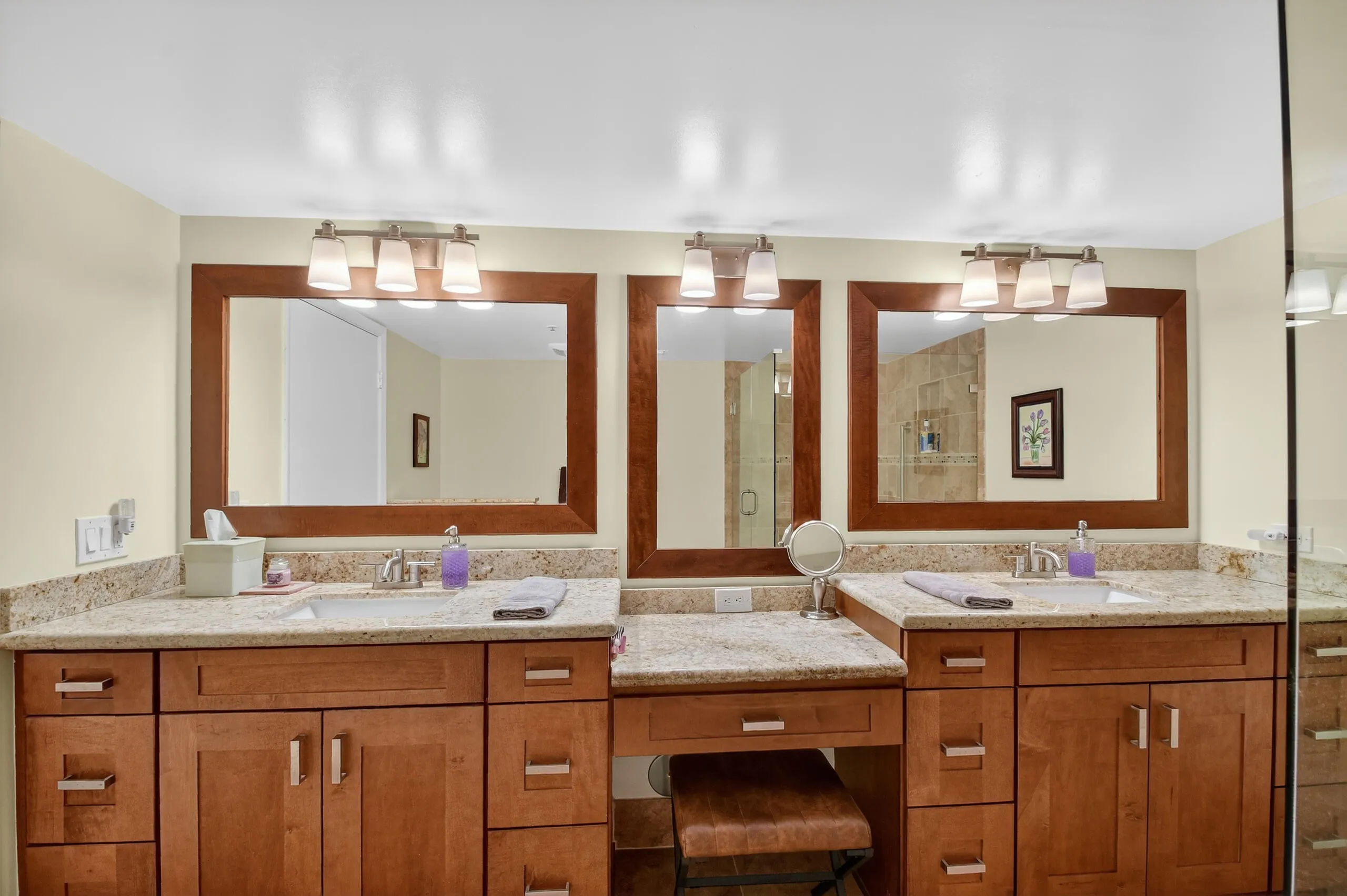 Updated primary bathroom with dual sinks and walk in shower.