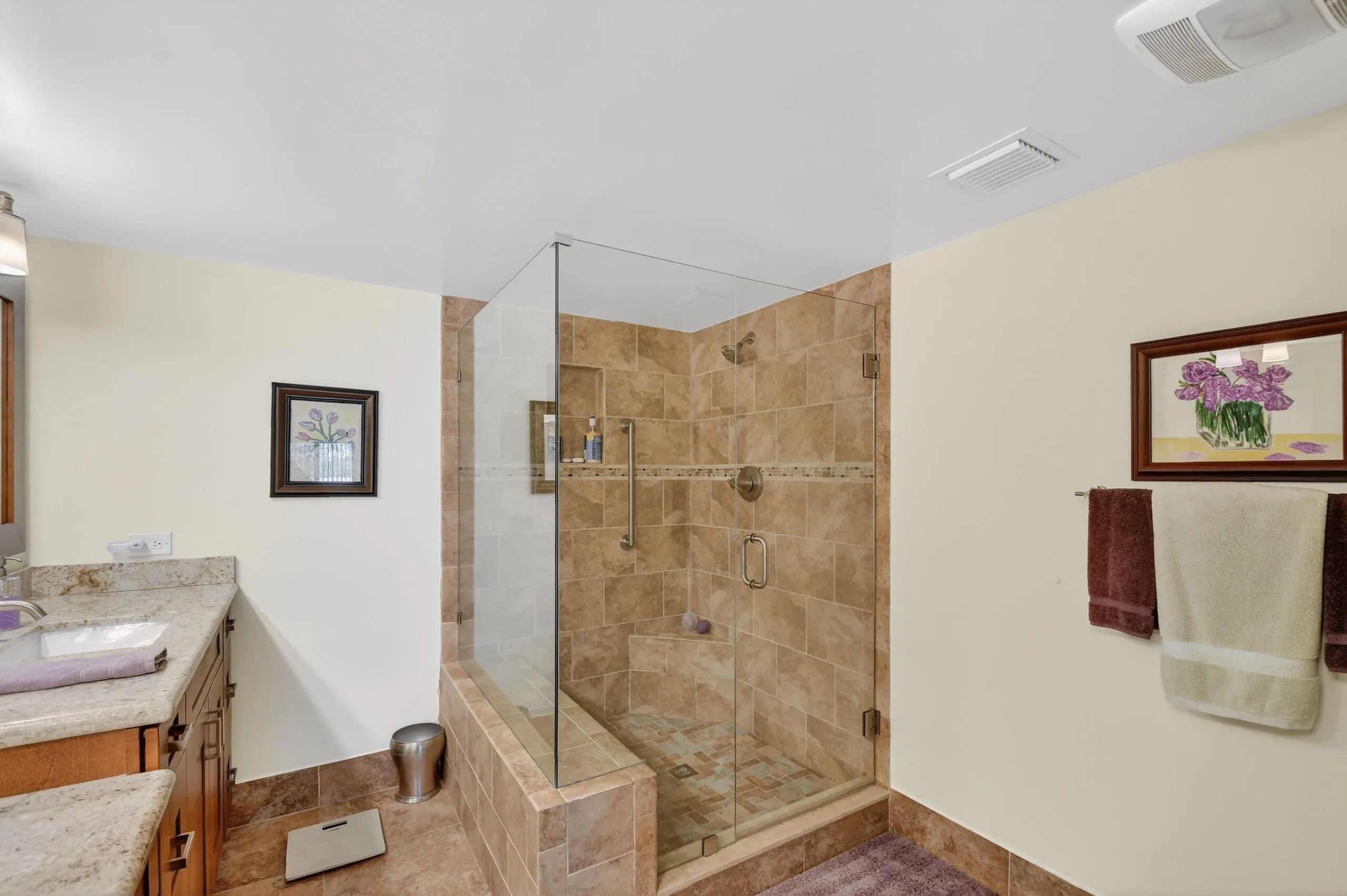 Updated primary bathroom with dual sinks and walk in​​‌​​​​‌​​‌‌​‌‌​​​‌‌​‌​‌​‌​​​‌​​ shower.