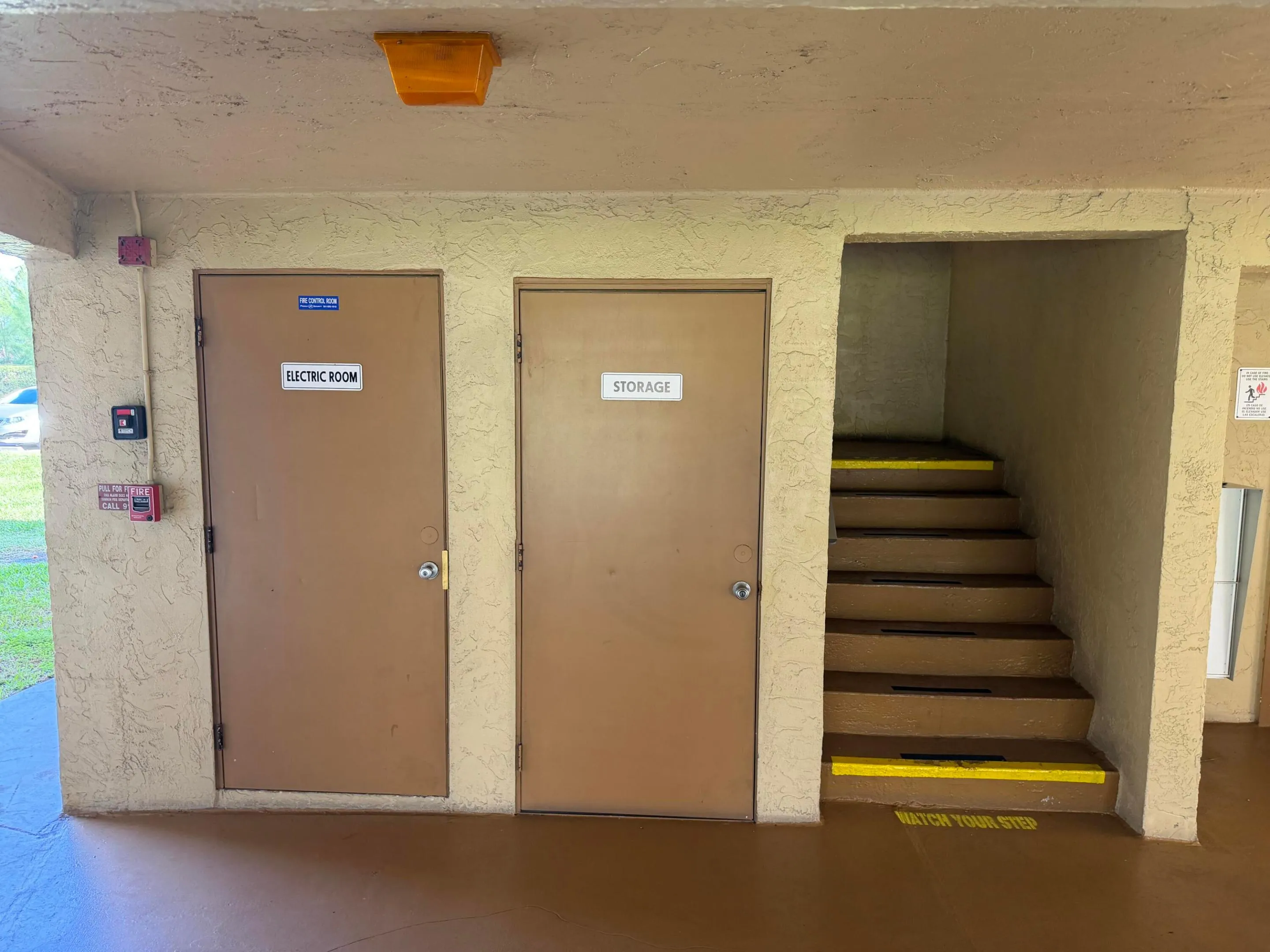 Steps next to elevator