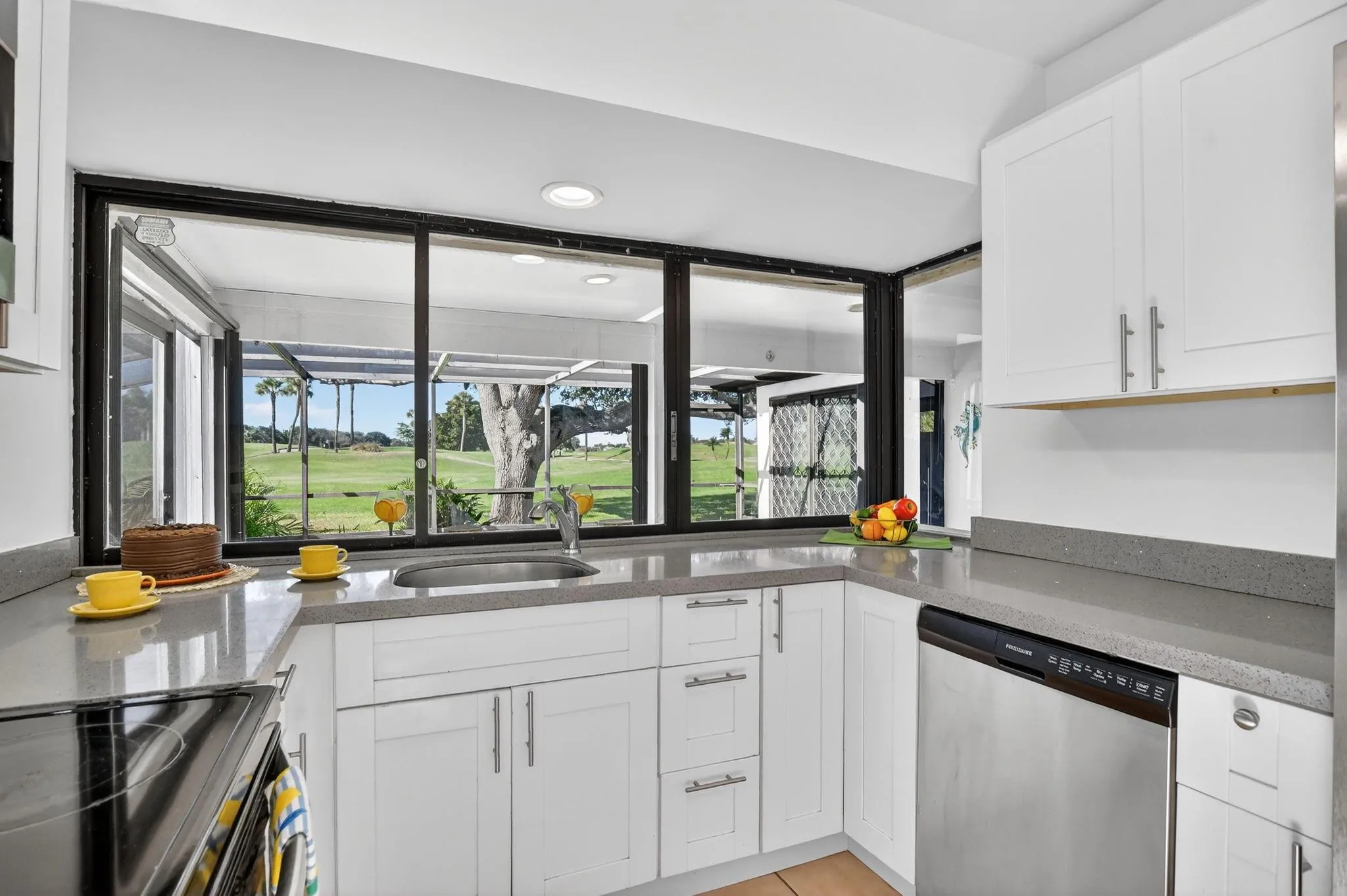 Great pass thru to covered patio is perfect for entertaining.