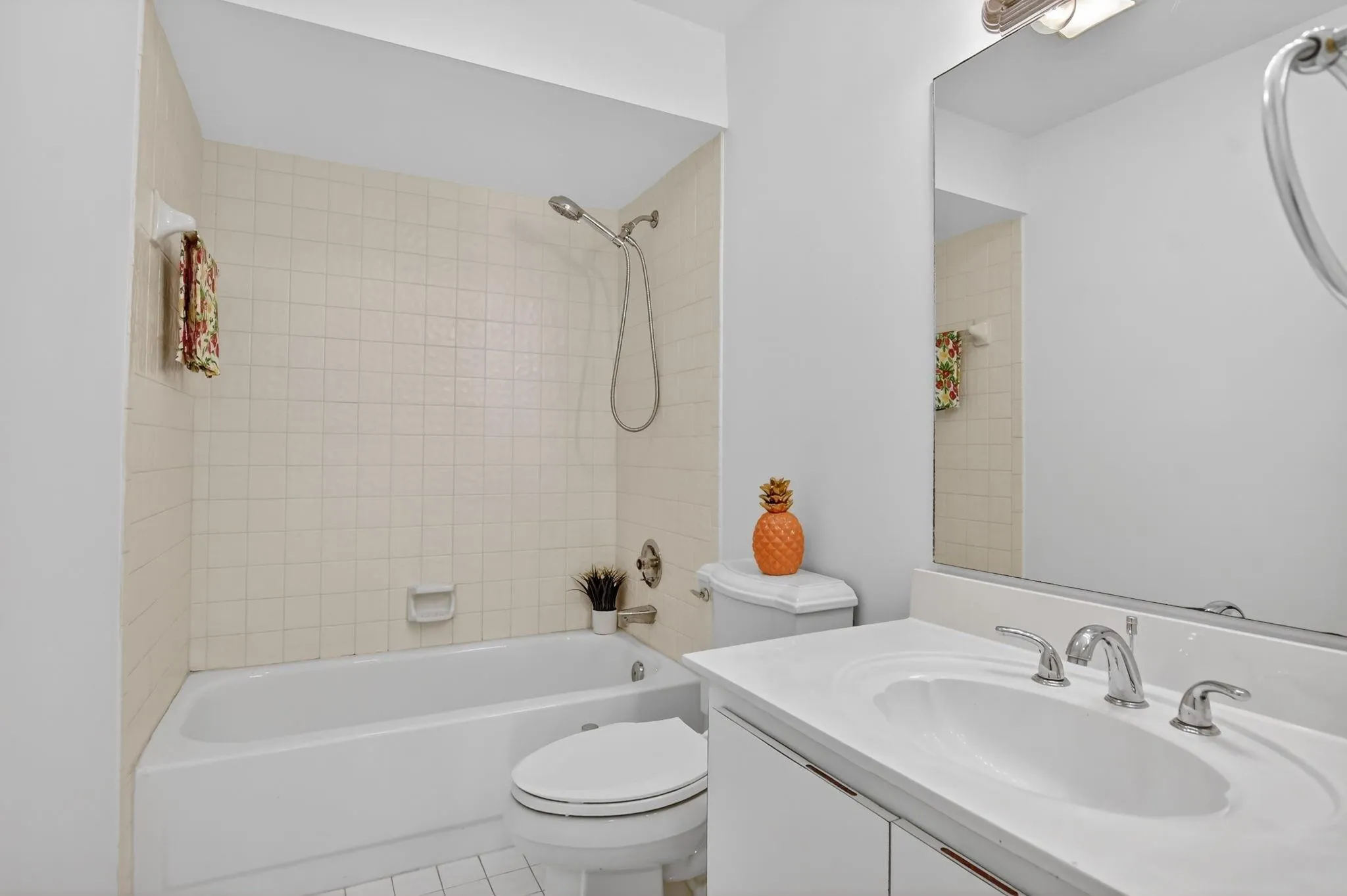 Guest bath with shower/tub combination for the kiddos.