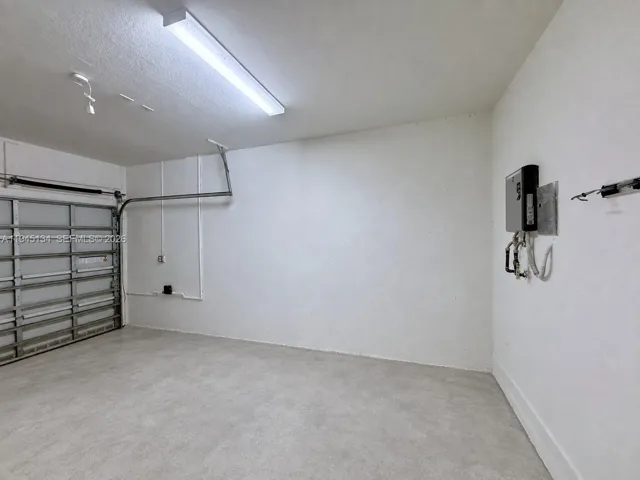 Spacious one-car garage with ample room for parking, storage, and added convenience.