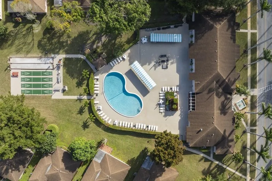 Clubhouse pool and shuffleboard arial view.