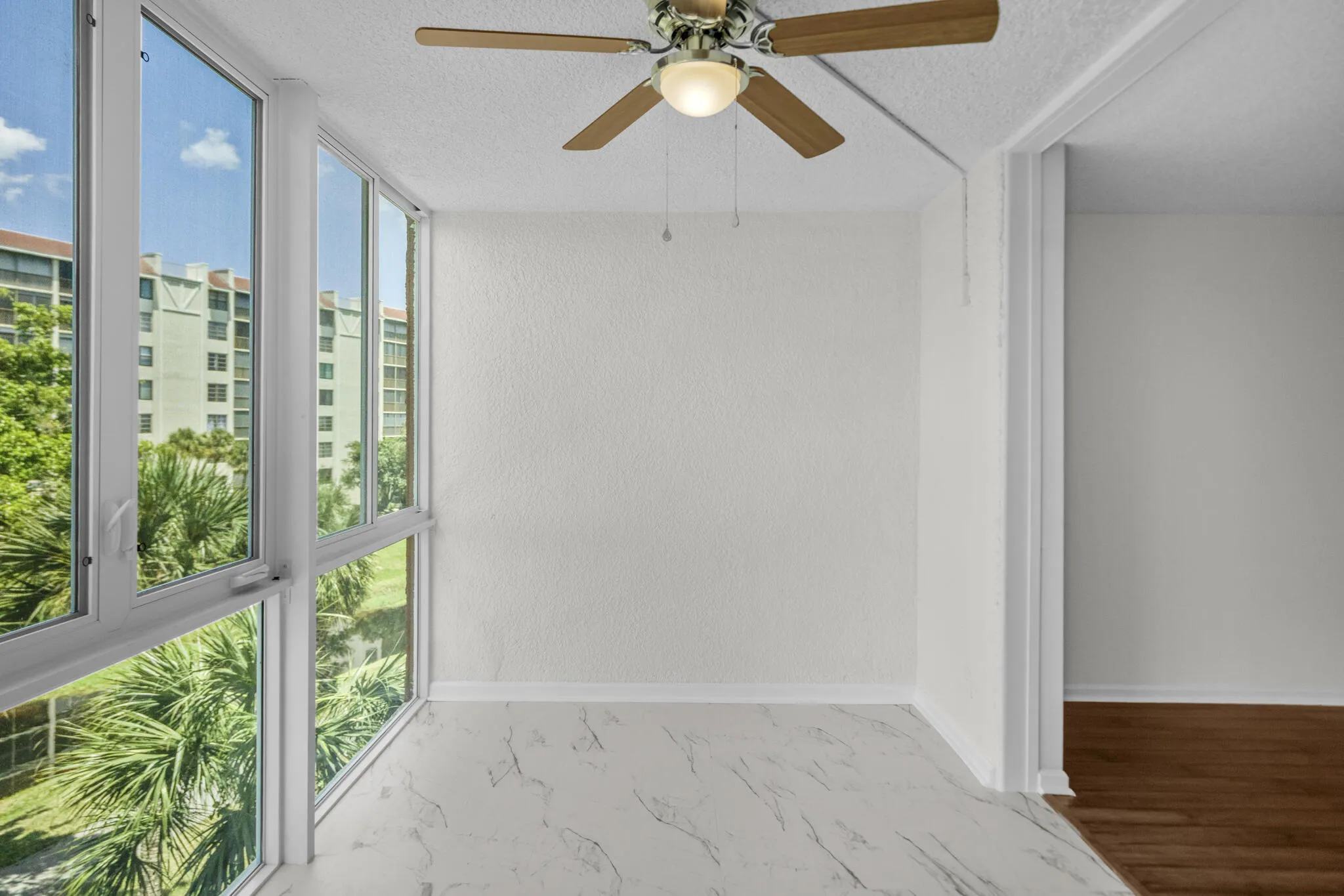 Florida room, new custome storm glass windows, freshly painted and new floor