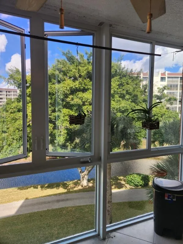 Beautiful new storm windows with a tranquil water landscape View