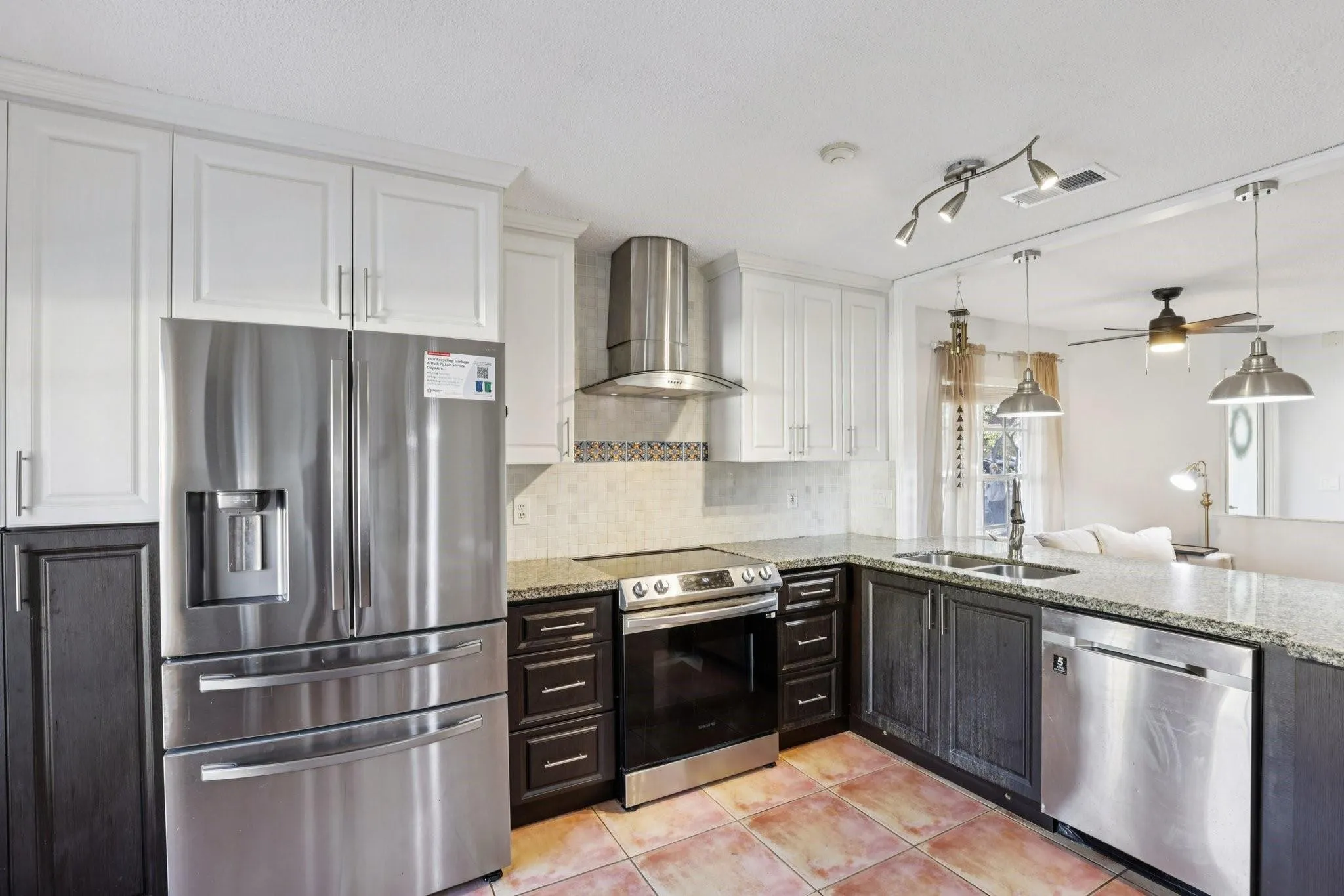 The kitchen is thoughtfully designed with both functionality and flow in mind.