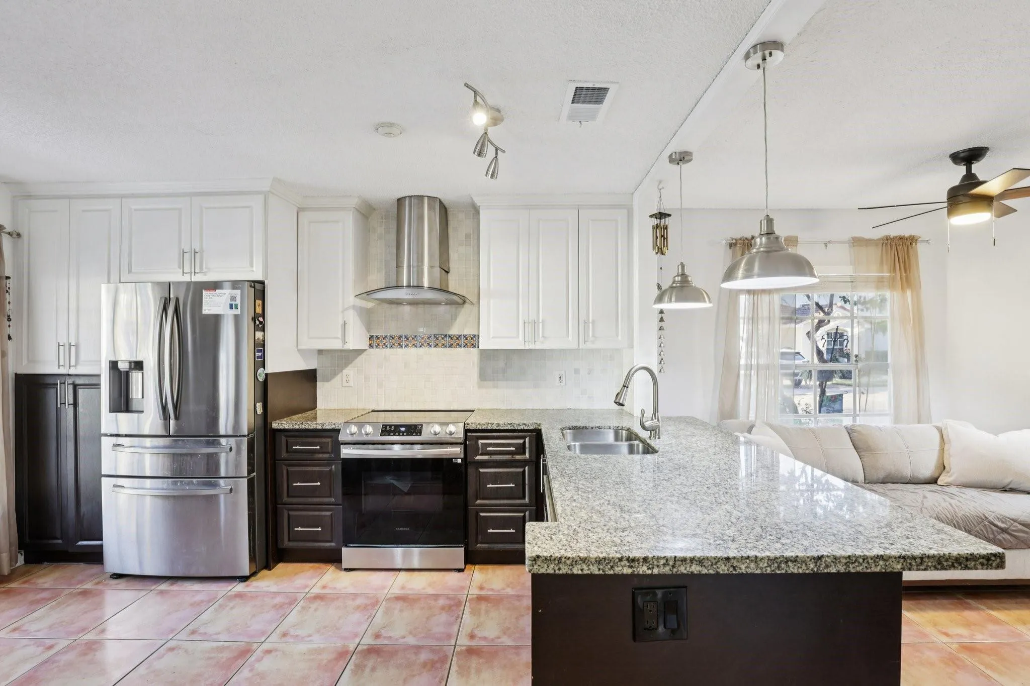 Offering ample counter space and abundant cabinetry, it provides plenty of room for meal preparation, storage, and organization.