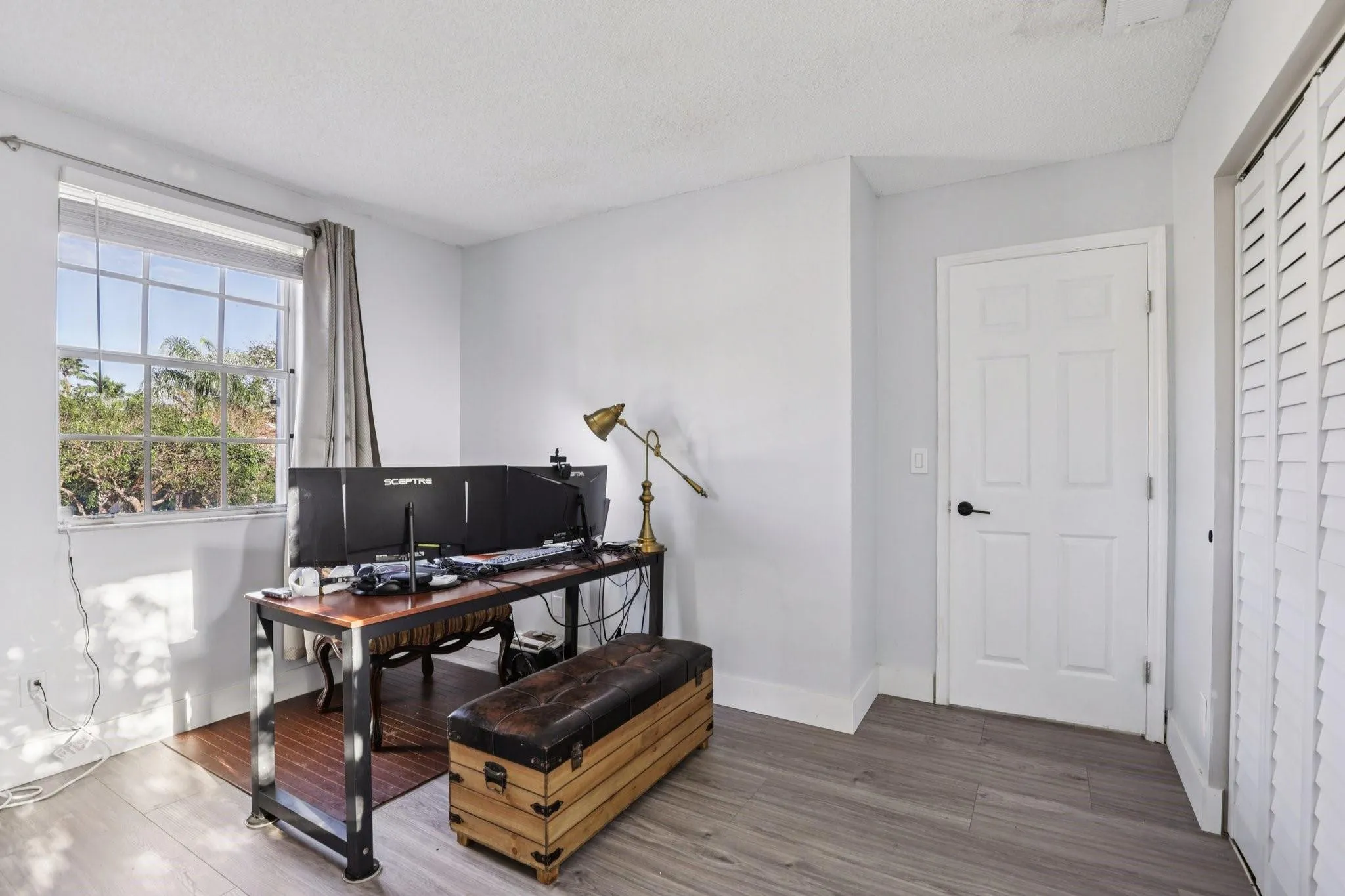 Its layout comfortably accommodates workstations, gaming setups, or multi-purpose furnishings while maintaining a quiet and focused environment.