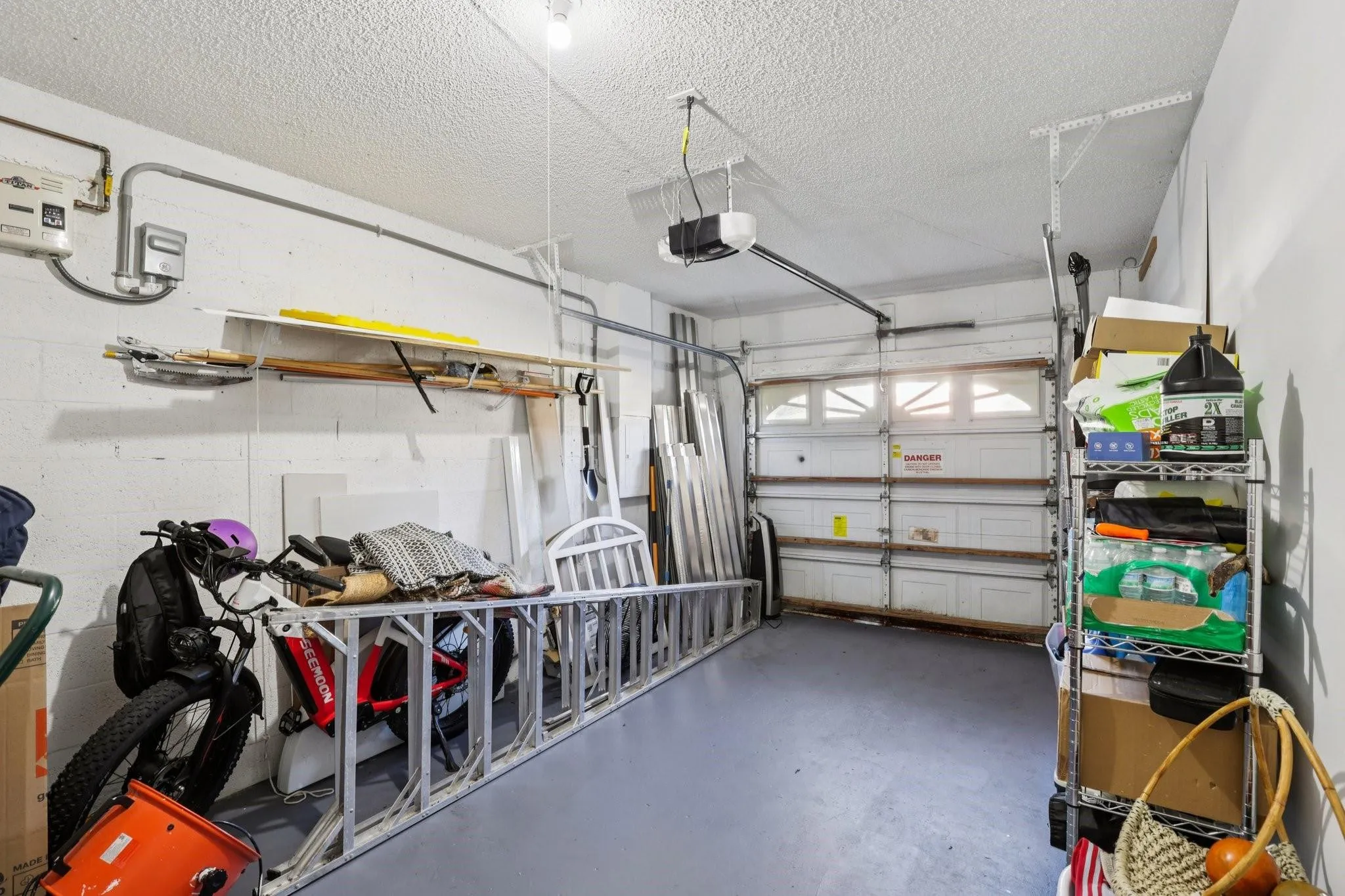 The garage provides ample space for vehicle parking and additional storage.