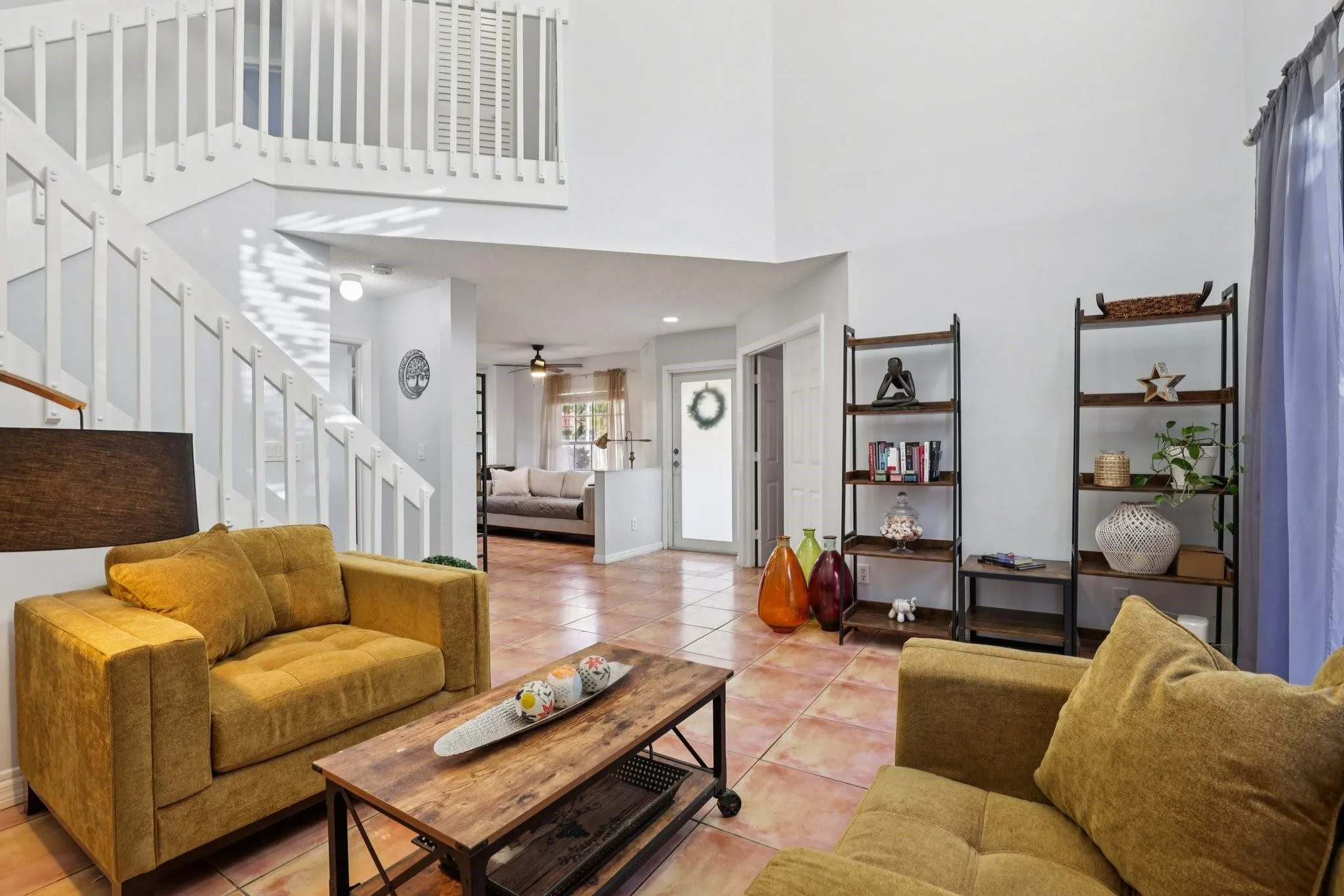 Positioned near the front of the home, this room benefits from an abundance of natural light that enhances its open and welcoming atmosphere.