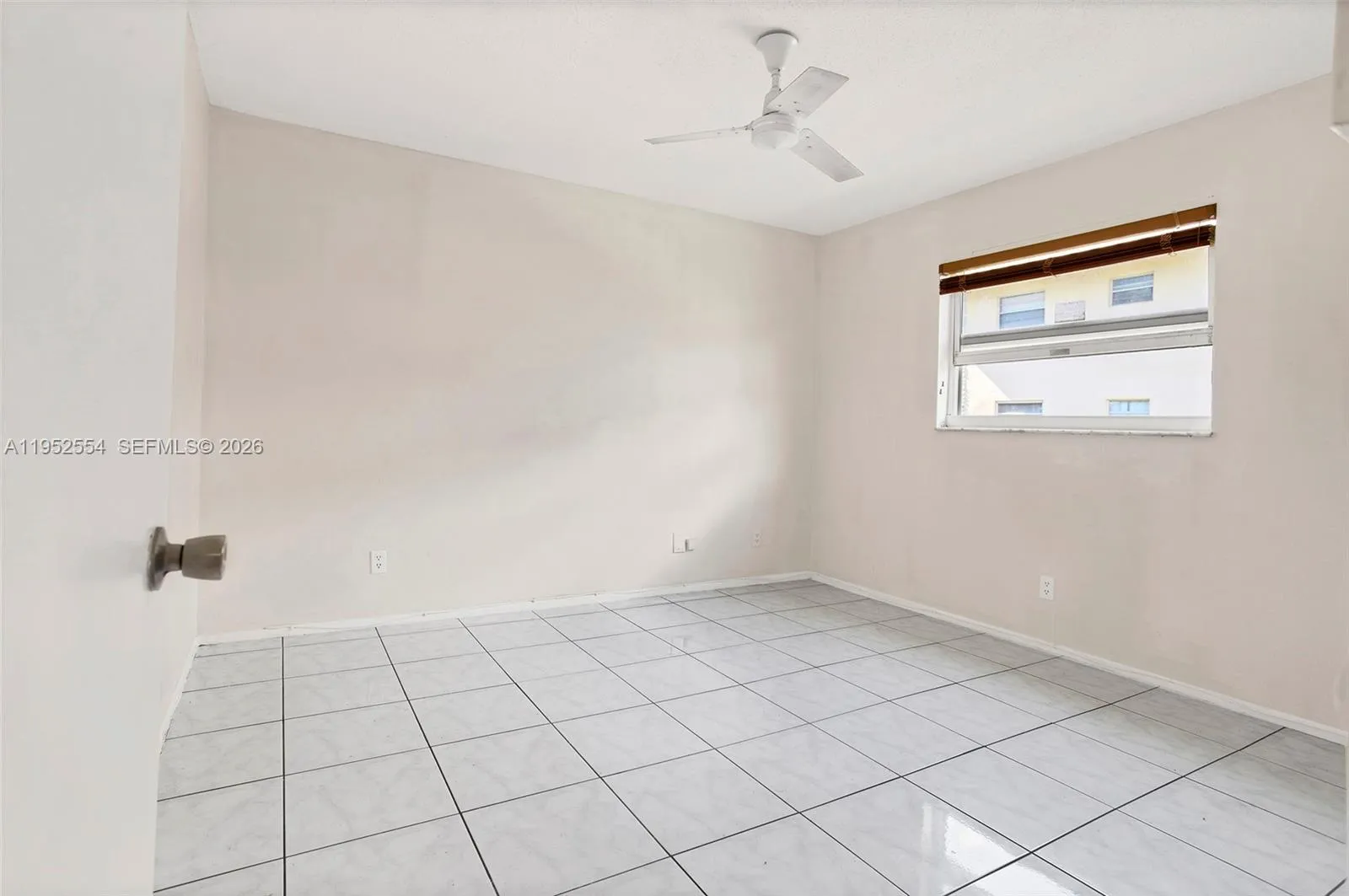 GUEST BEDROOM WITH IMPACT WINDOW