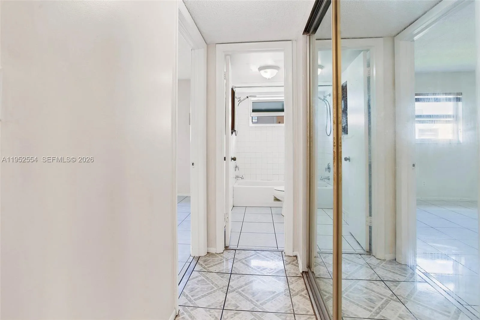 HALLWAY LEADING TO GUEST BATHROOM