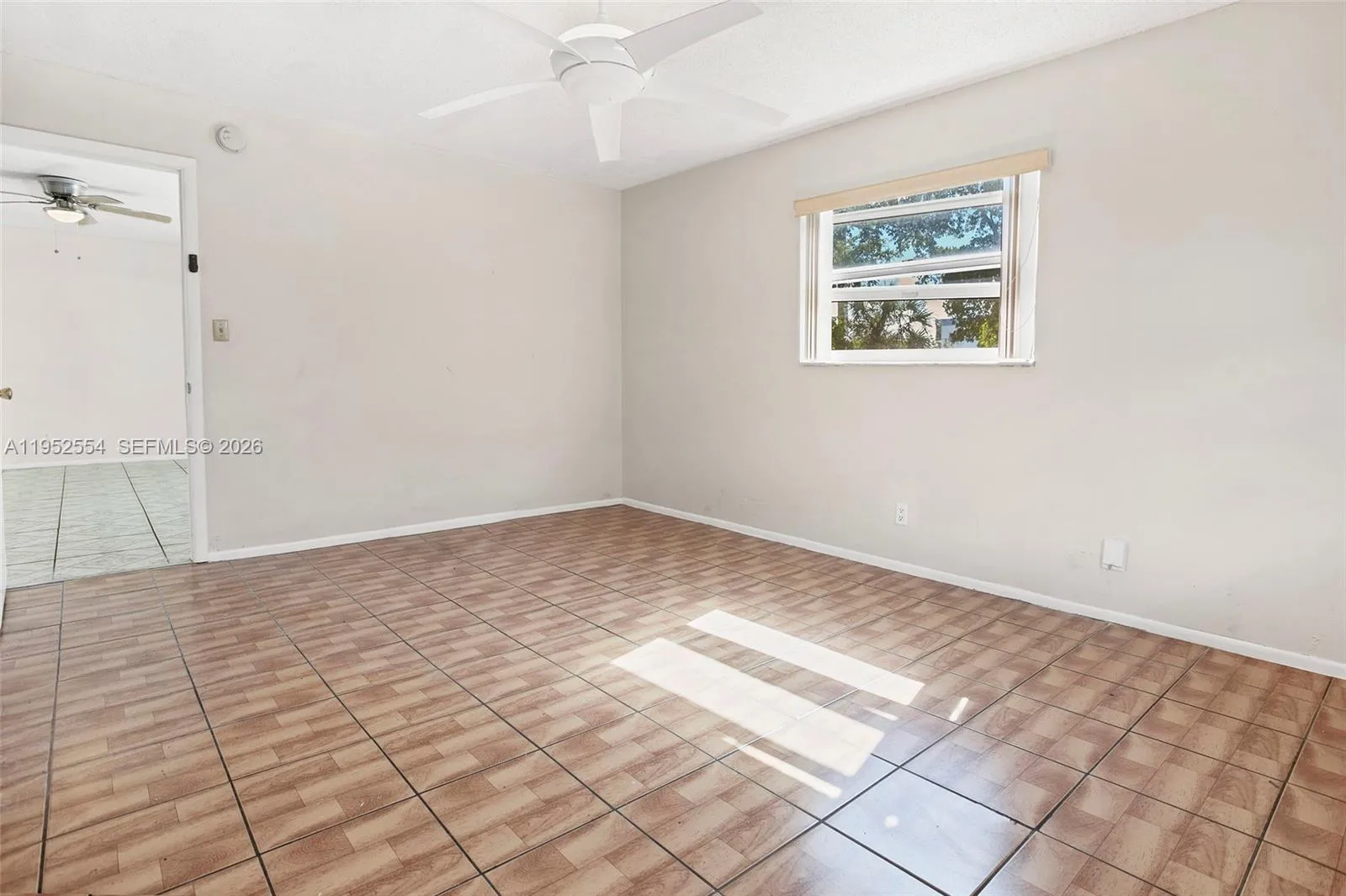 LARGE BEDROOM WITH REMOTE LIGHTED CEILING FAN