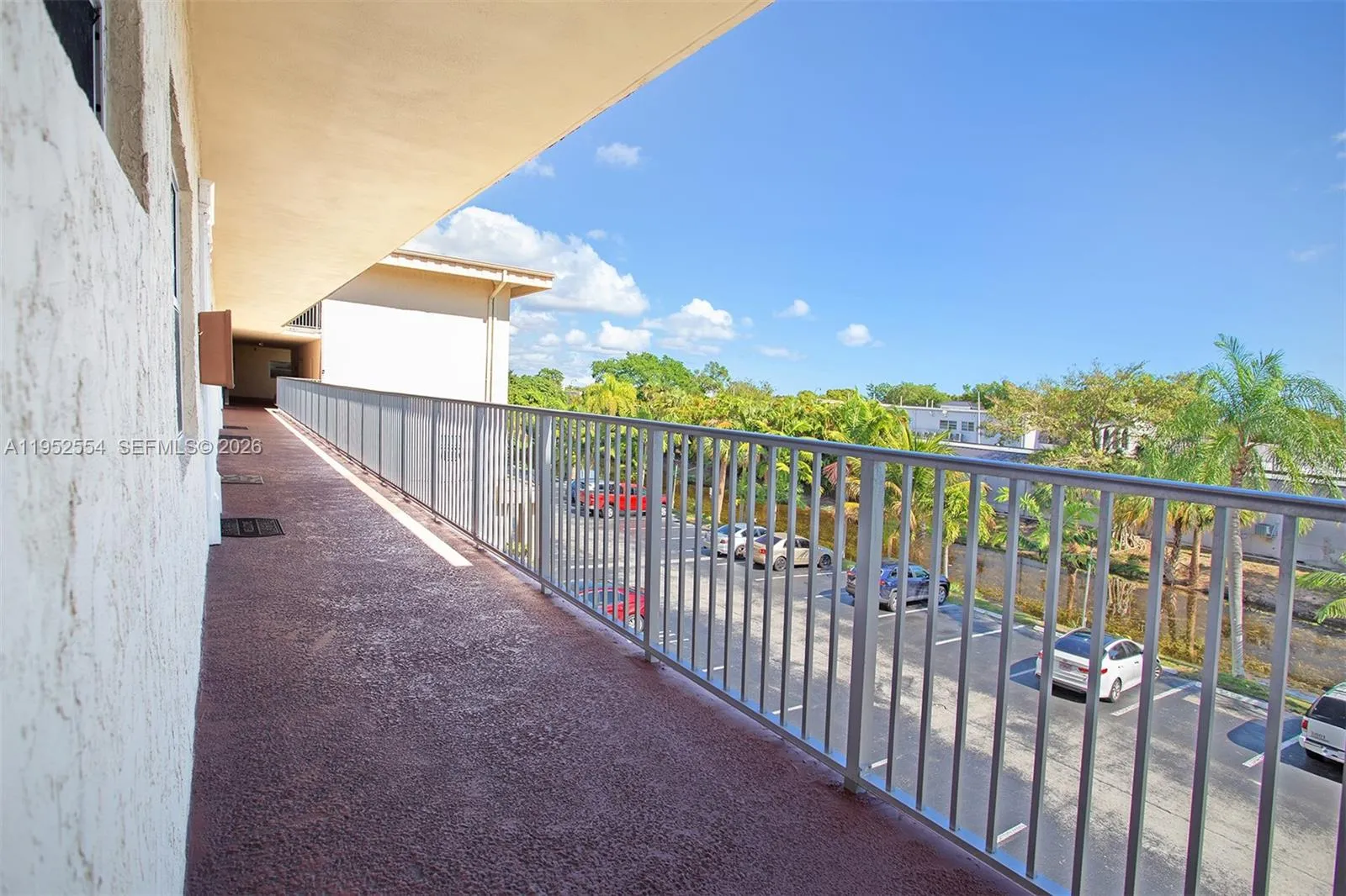 CATWALK FROM UNIT TO ELEVATOR AND LAUNDRY ROOM