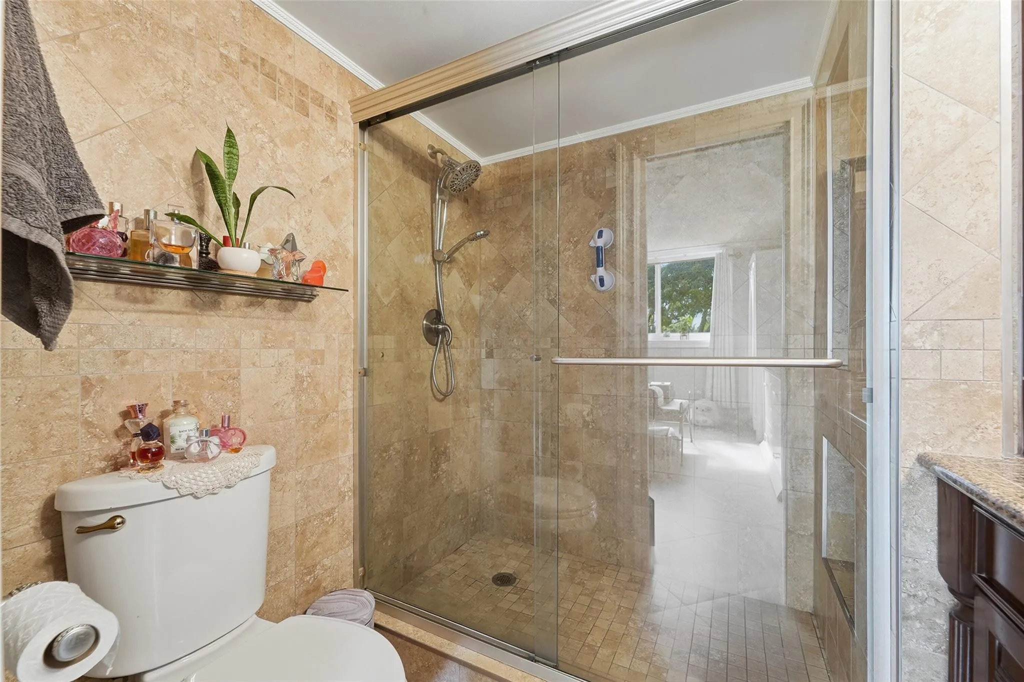 Your master bath has a frameless shower door, walk in shower.