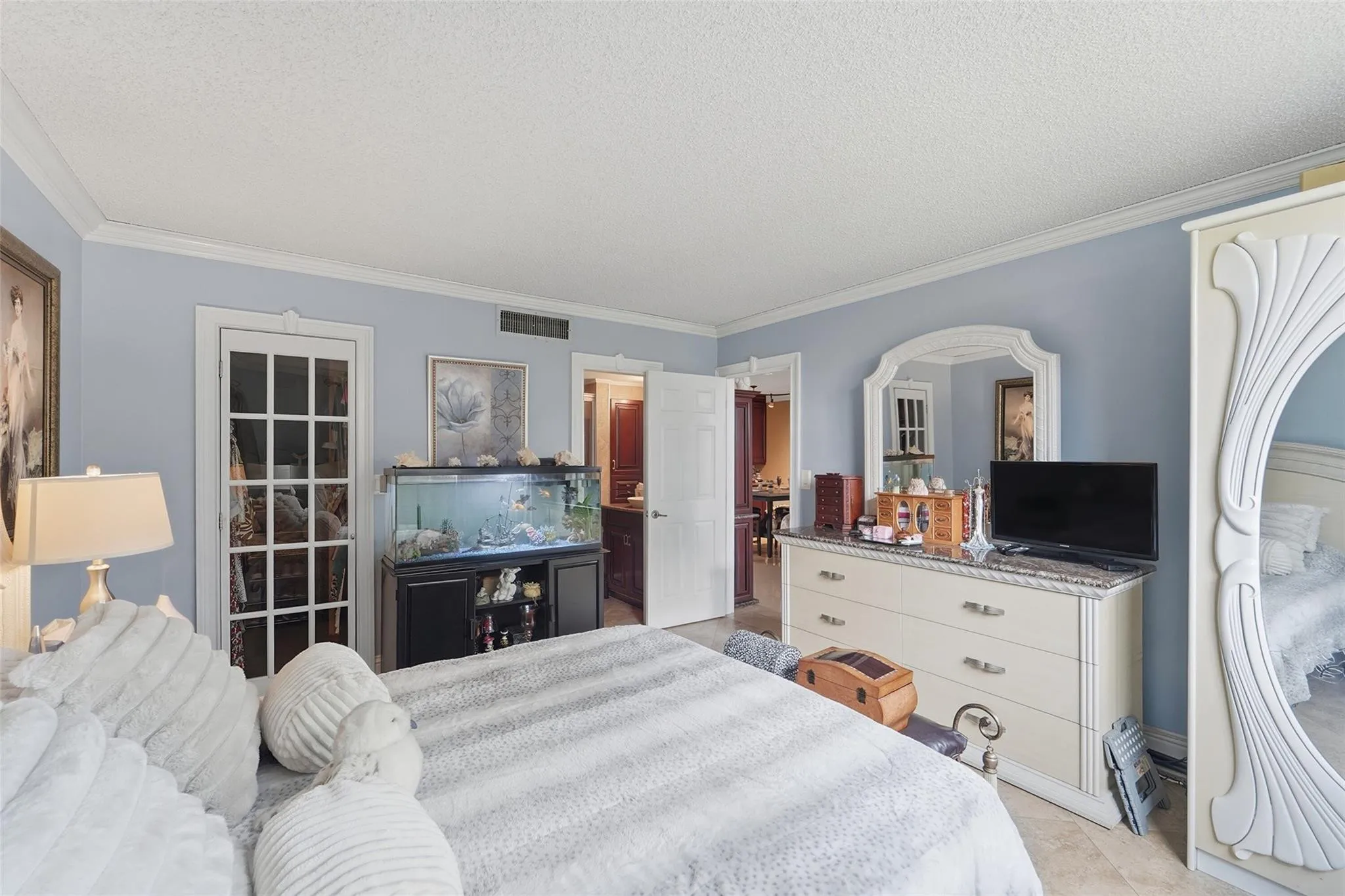 The master bedroom is large enough for a king sized bed. There is a walk in closet. Seller can leave the furniture if you want it.