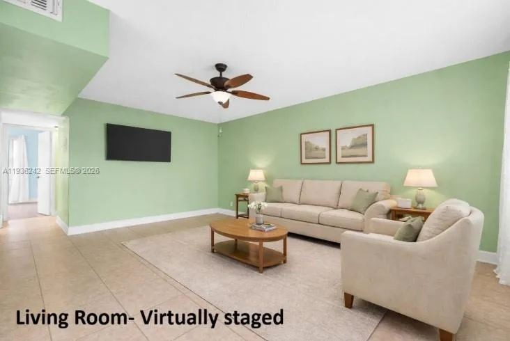 Virtually staged living room (Already mounted TV included in purchase)