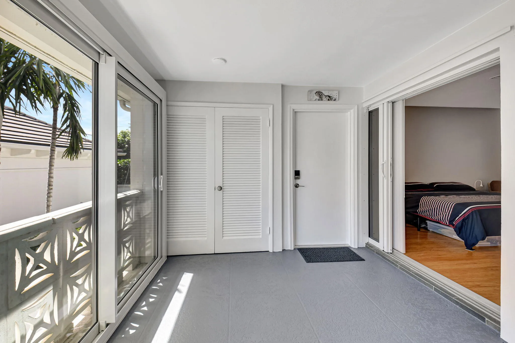 DOOR TO REAR ENTRANCE ON THE RIGHT.