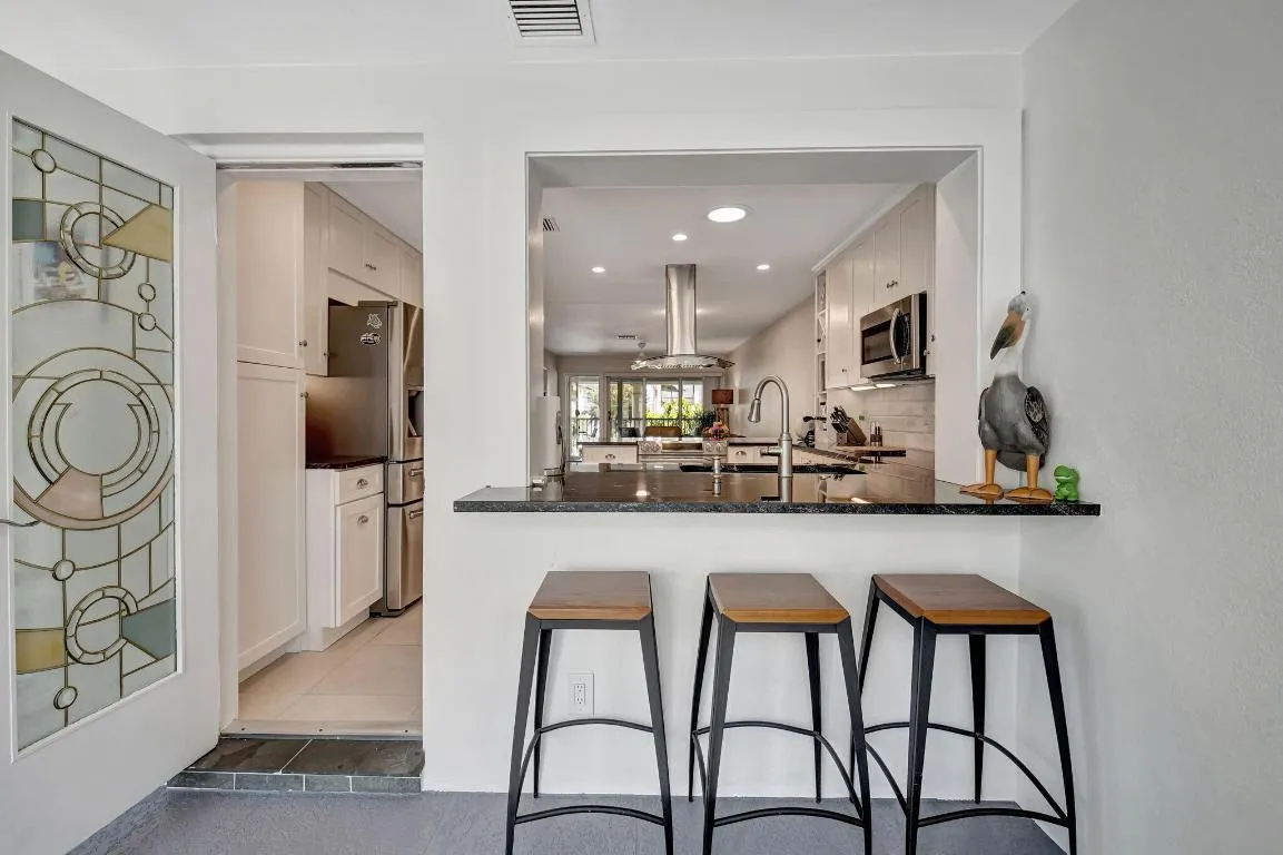 FLORIDA ROOM TO KITCHEN