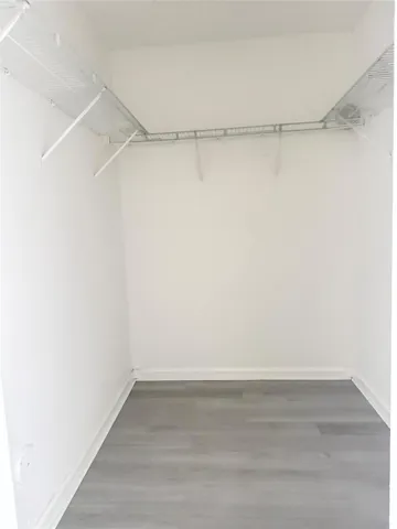 Walking closet in master bedroom