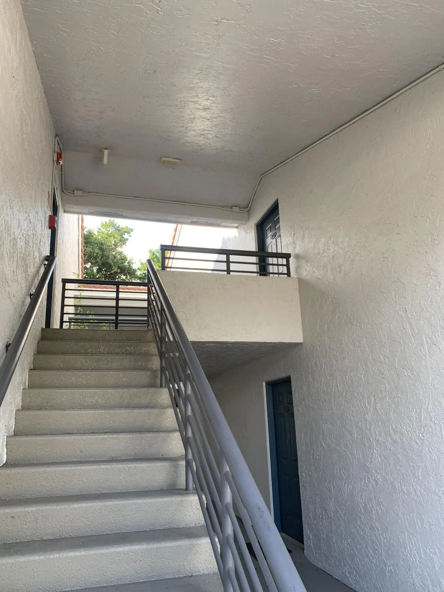 Stairs thast lead to front door