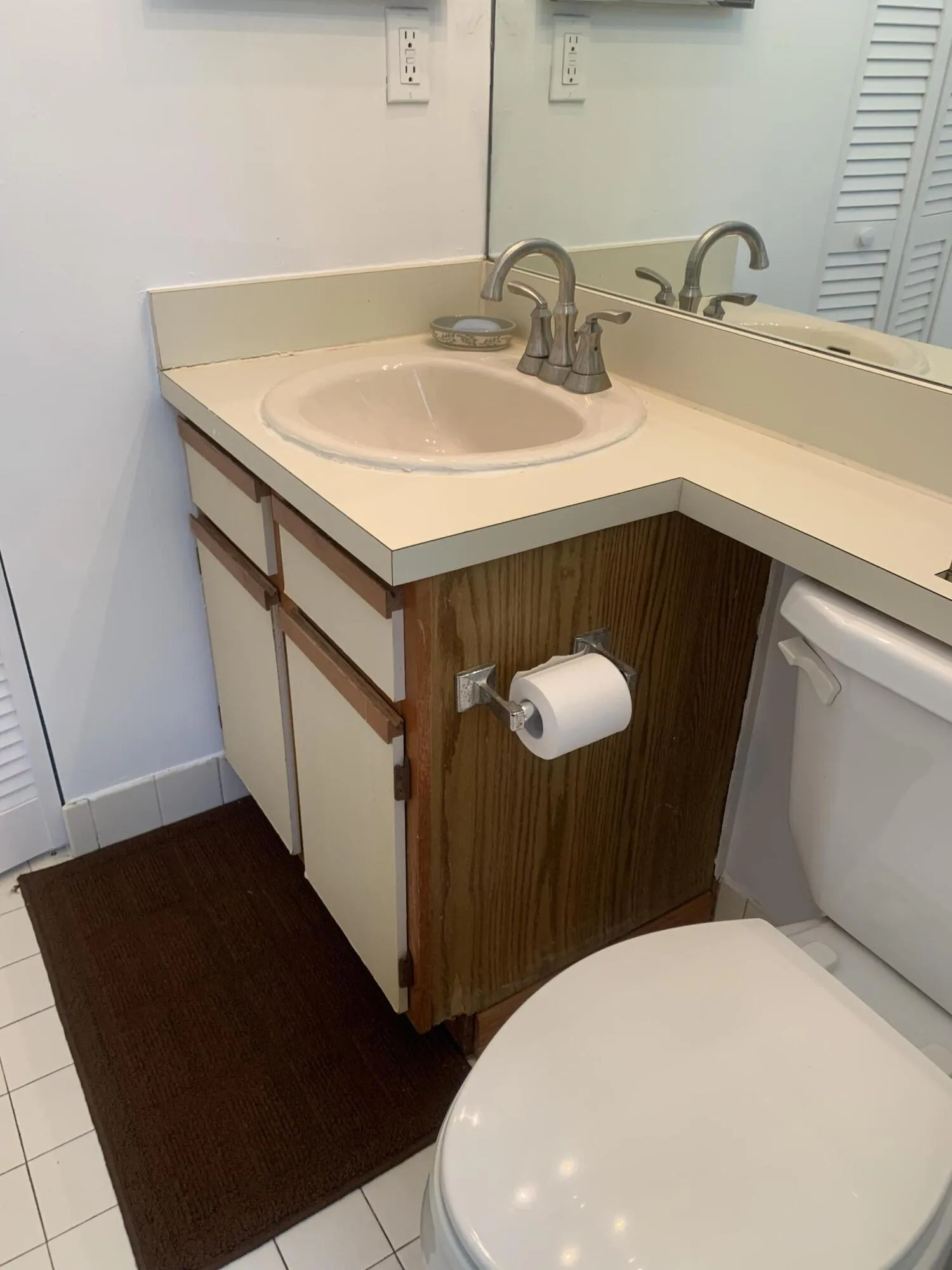 Bathroom vanity and toilet