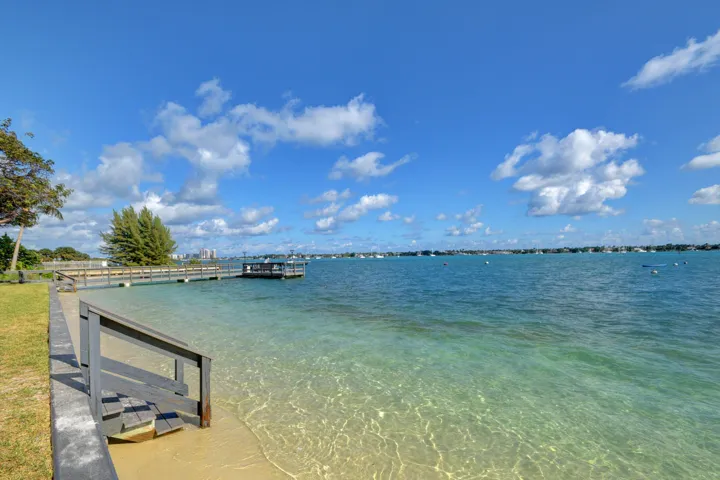 View of beach and fishing pier (high tide)