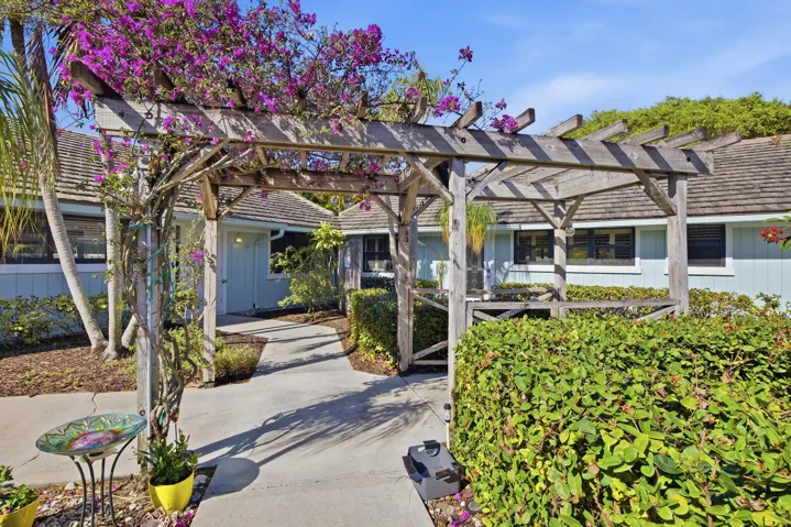 Beautiful arbor leading to your home.