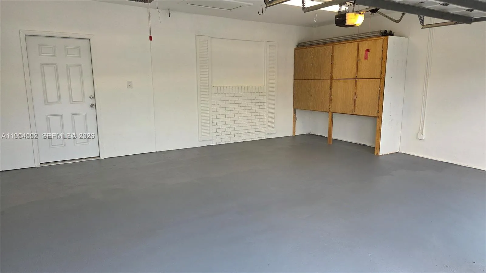 Full 2 car with storage and access to house through utility room.