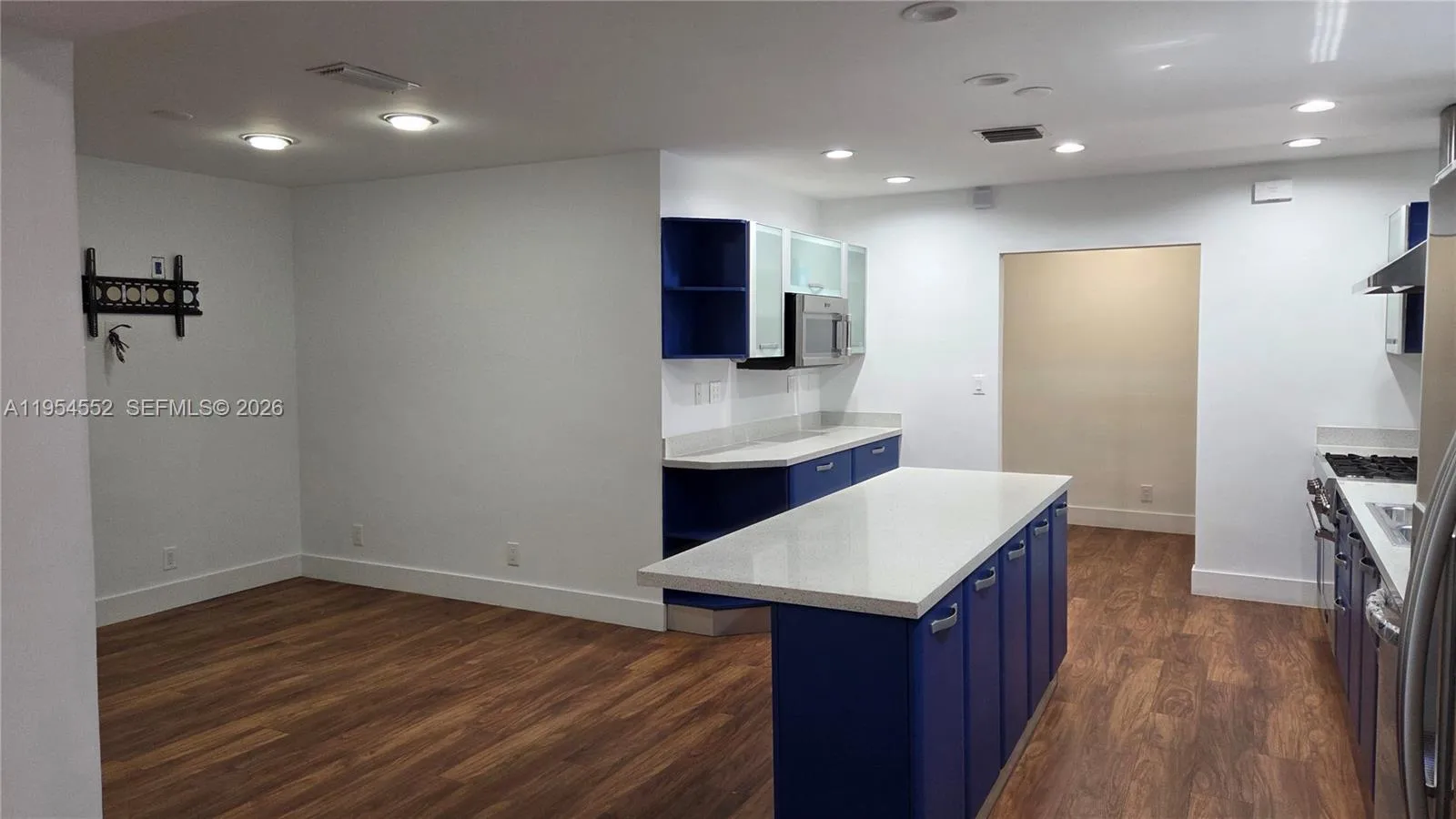 Kitchen and Dining Room with Pantry in Background