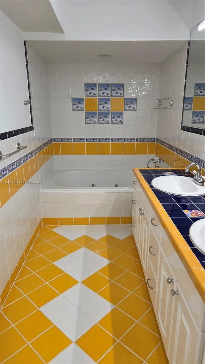 Master Bath with Dual Sinks and Jacuzzi Tub