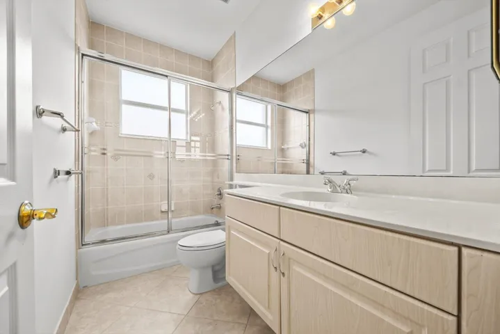 Guest bathroom with tub and shower combo