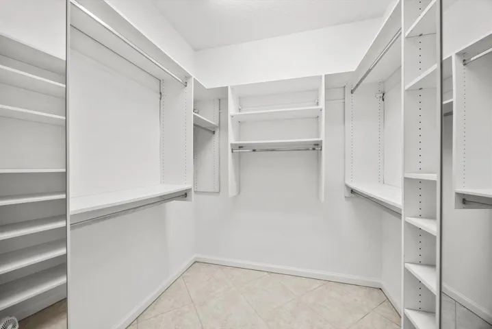 Separate his and hers custom closets.....