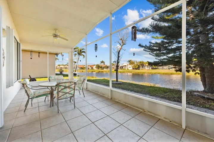 Screened patio with charming lake views