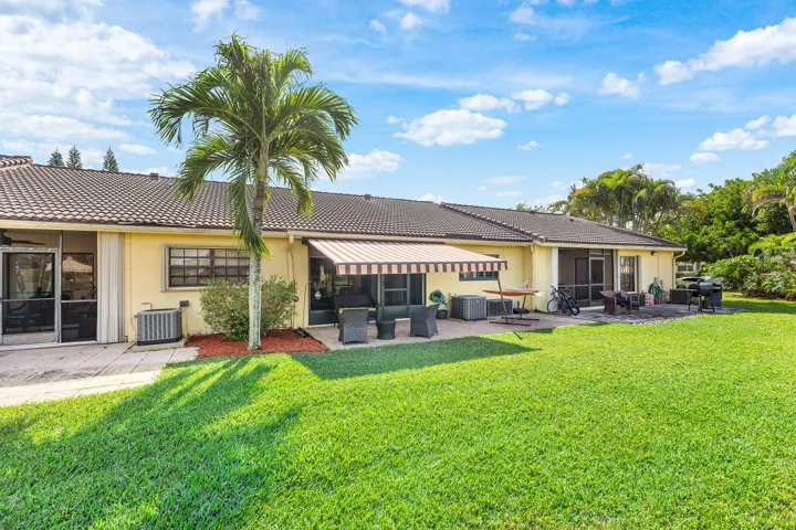 Retractable Awning & Huge Paver Patio