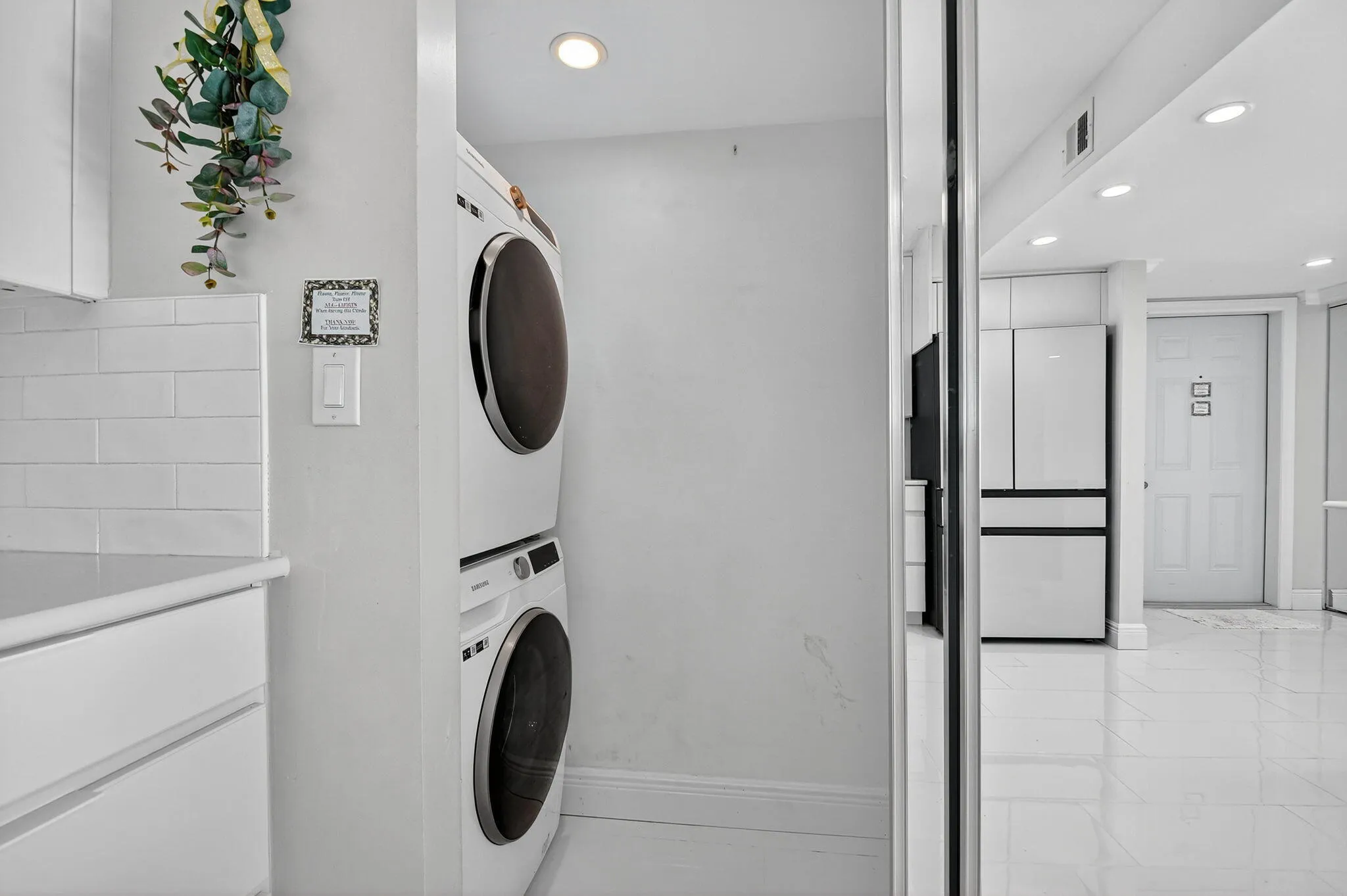 With the reflection of the mirrored doors