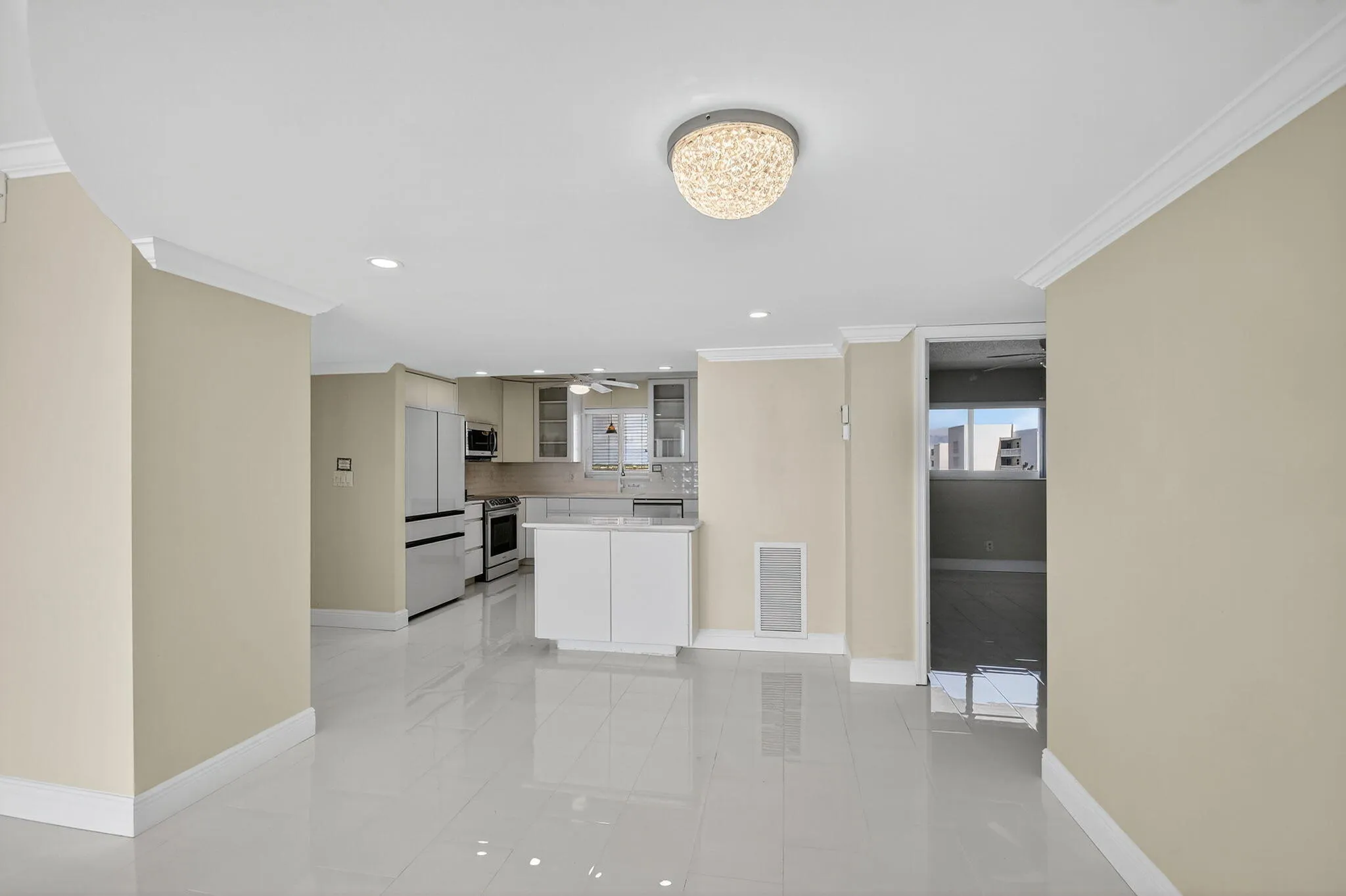 Living Room Towards Kitchen and Entrance