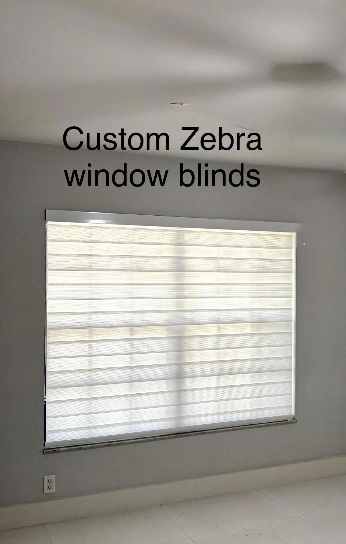 Custom Zebra window blinds throughout the house.